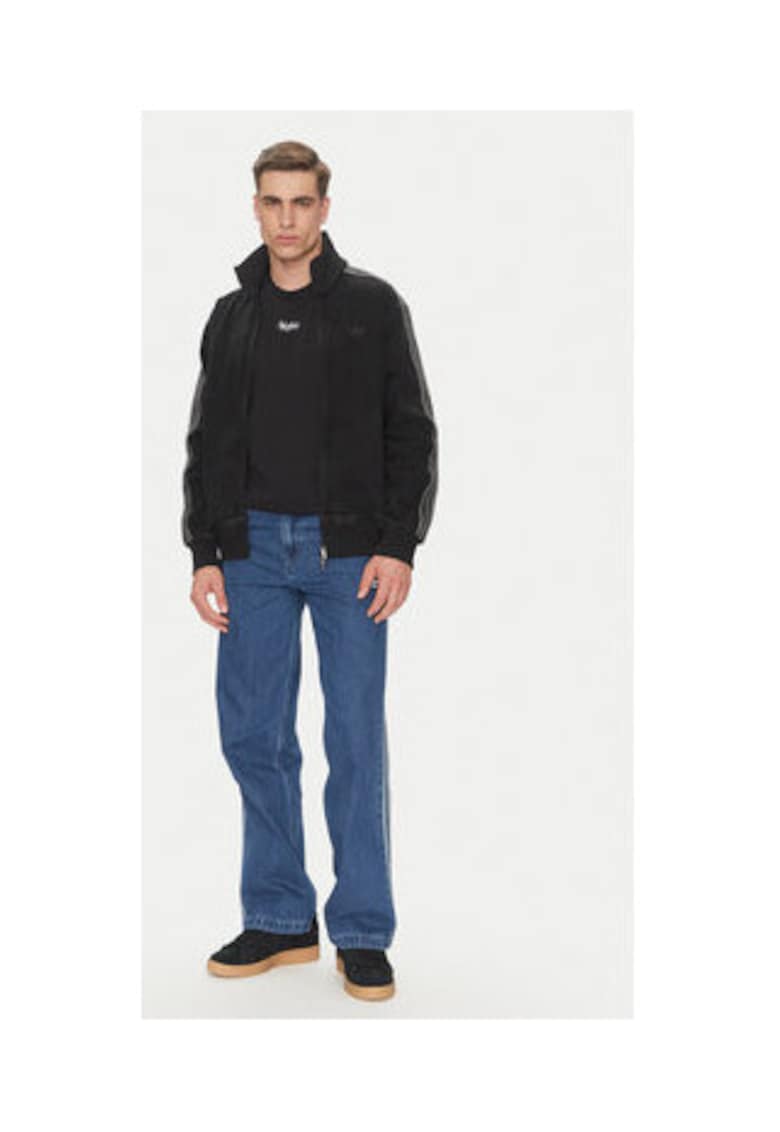 Blugi relaxed fit cu talie medie