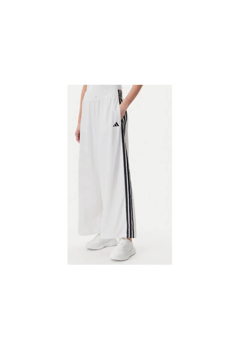 Pantaloni de trening evazati cu buzunare