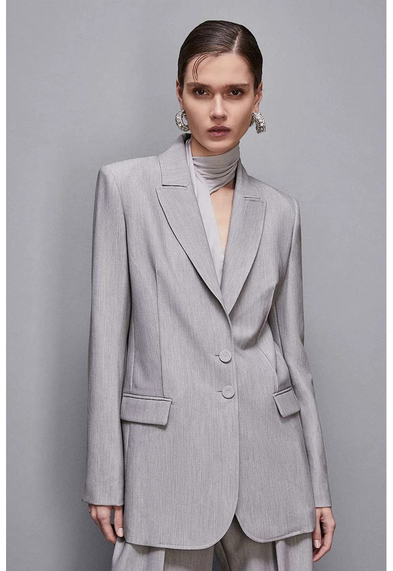 Sacou supradimensionat la un singur rând de nasturi