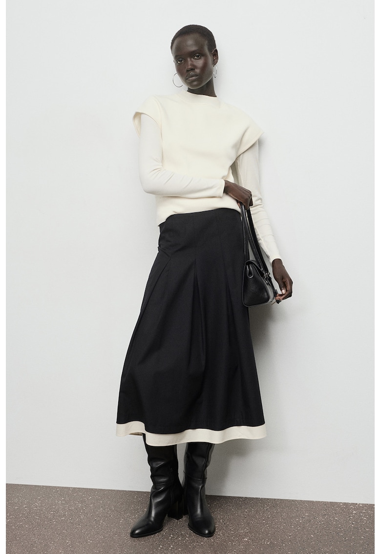 Fusta cu croiala in A si pliuri inversate