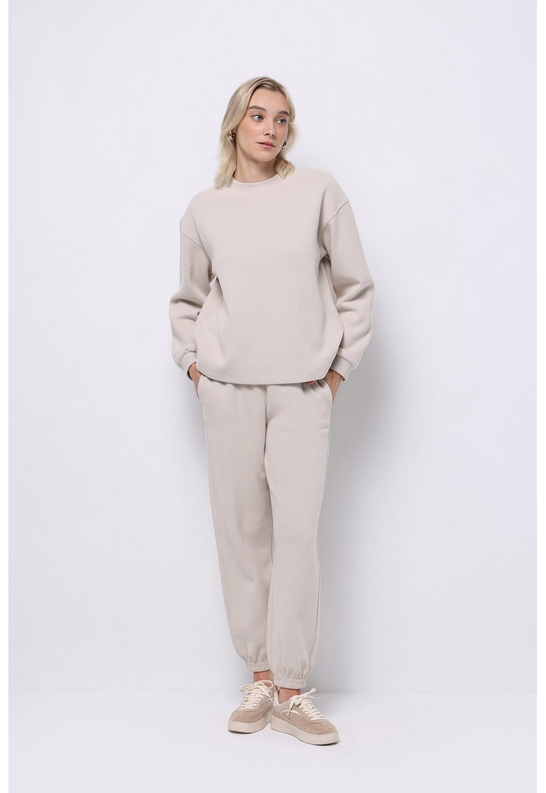 Pantaloni de trening cu croiala conica si snur de ajustare in talie