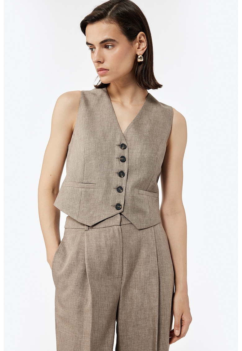 Vesta cu decolteu in V si nasturi contrastanti