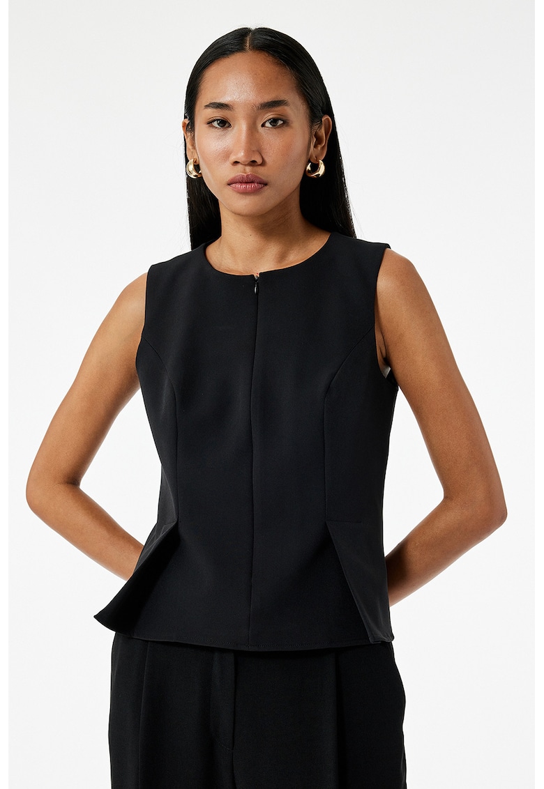 Vesta cu slituri frontale