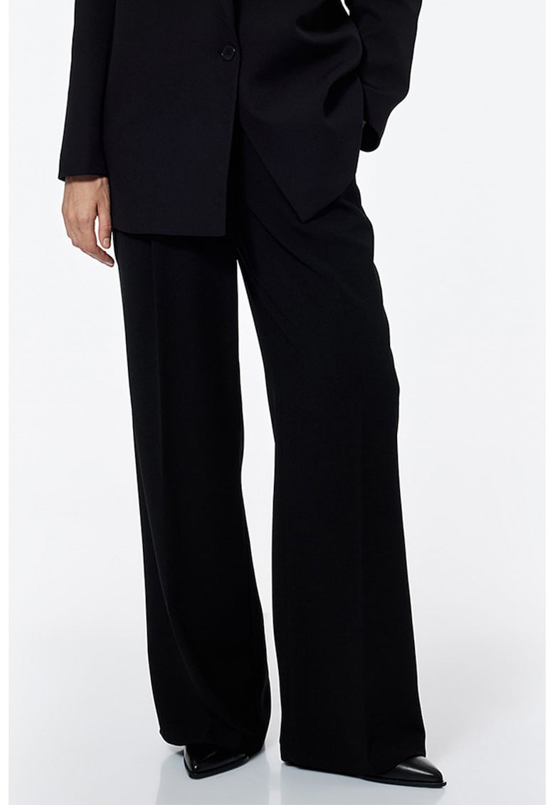 Pantaloni drepti eleganti cu buzunare laterale
