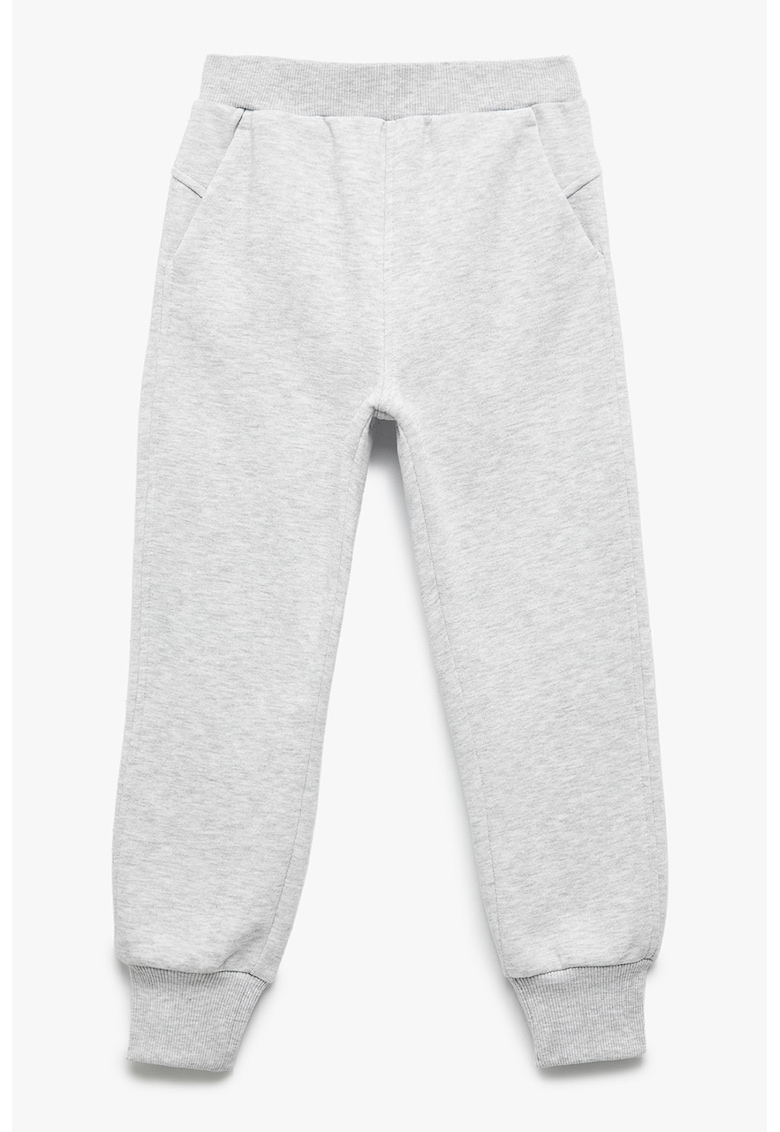 Pantaloni de trening cu model uni si buzunare laterale