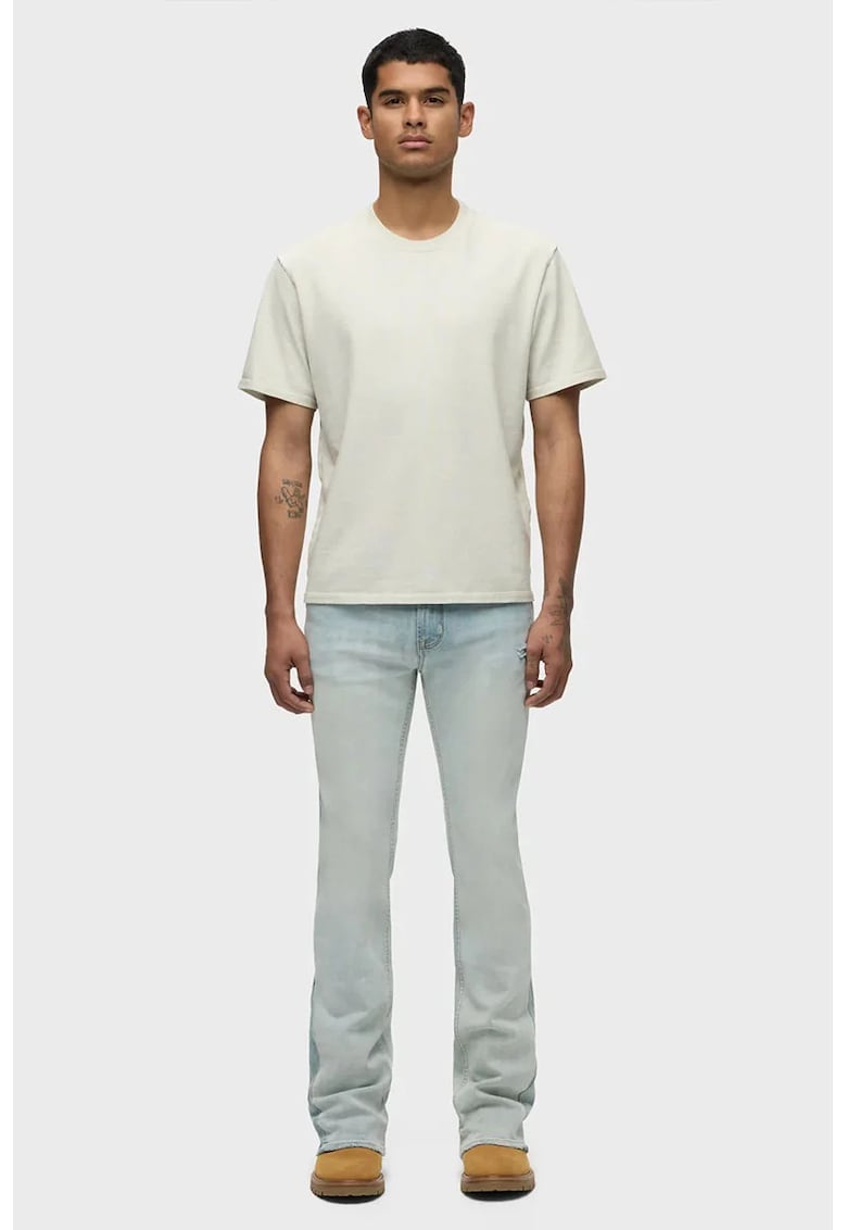 Blugi skinny evazați