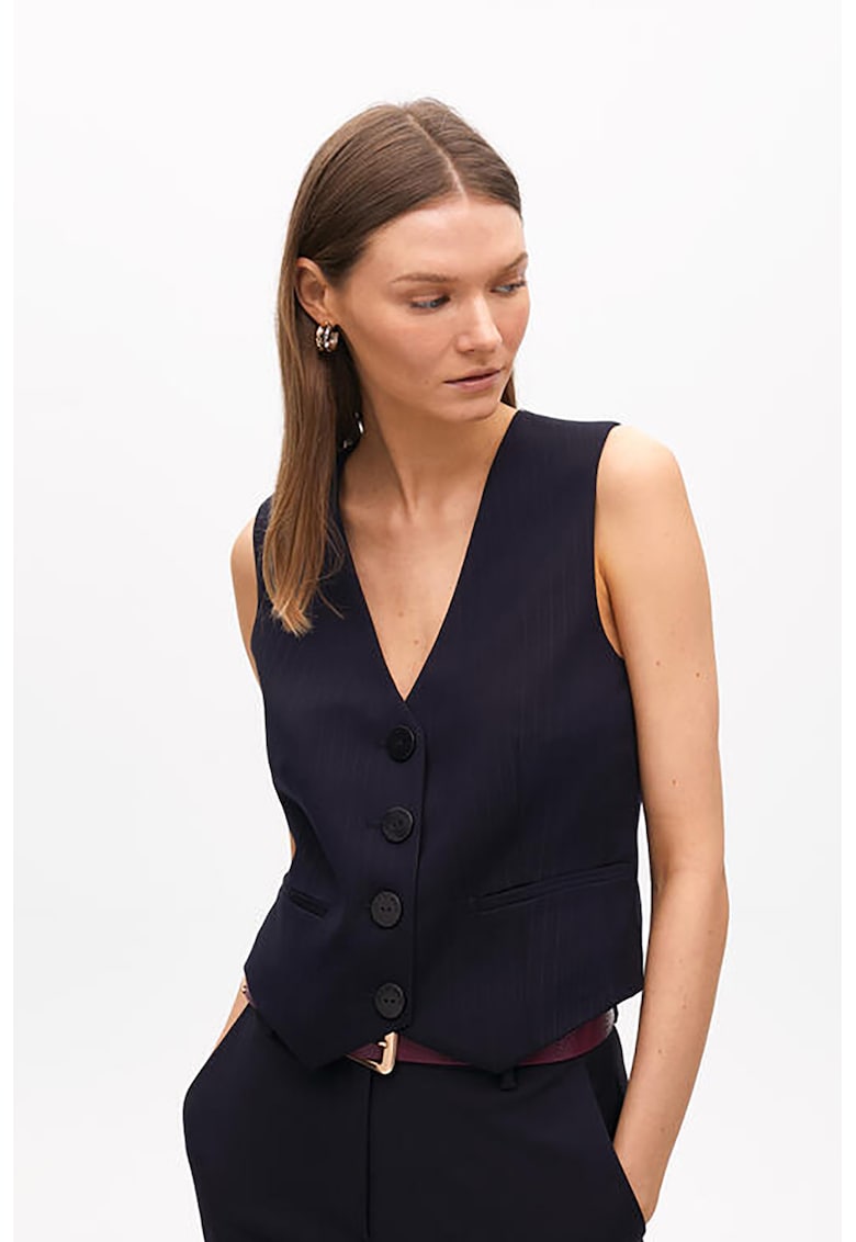 Vesta cu decolteu in V si catarama ajustabila