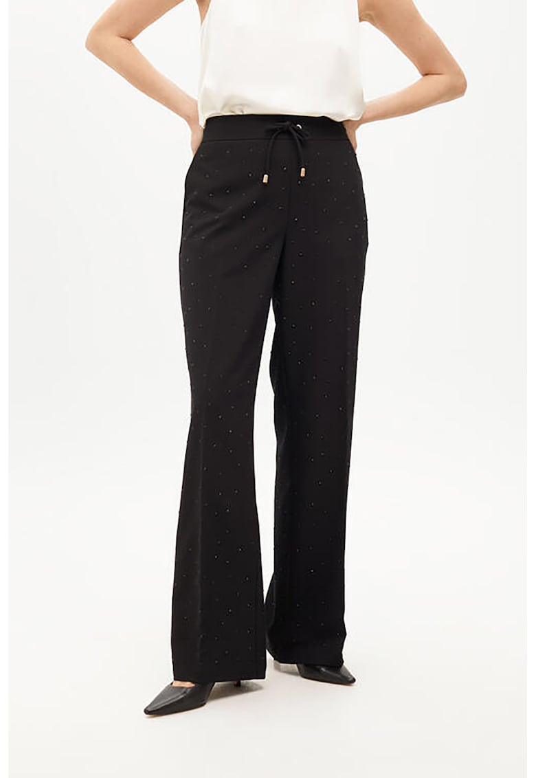 Pantaloni cu croiala ampla si strasuri