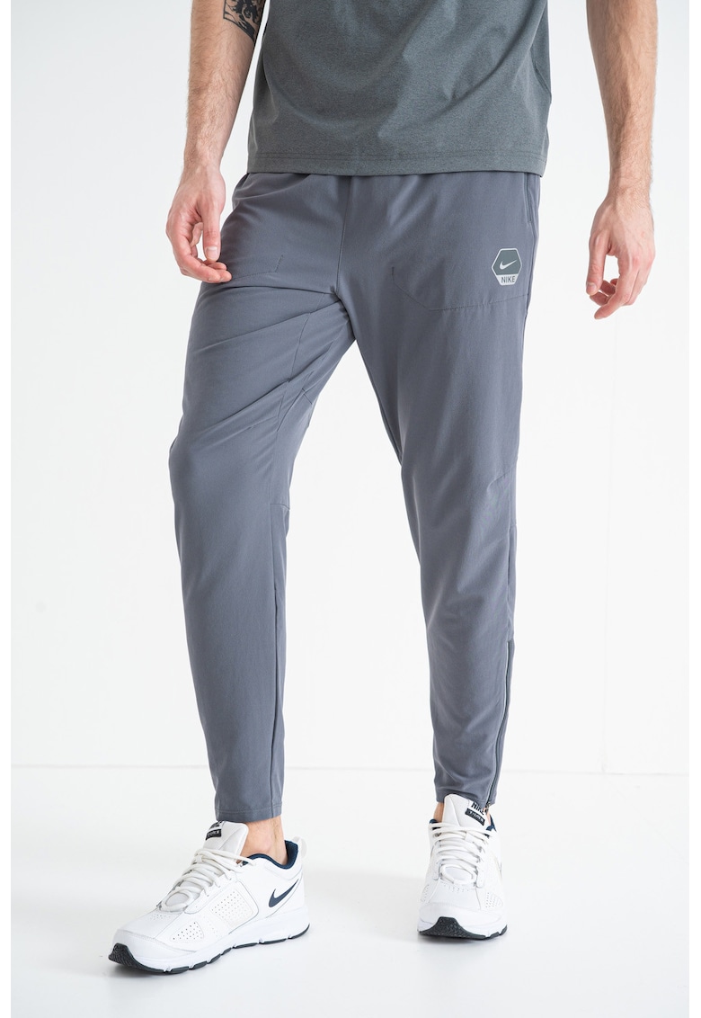 Pantaloni conici de trening cu logo - Kaki