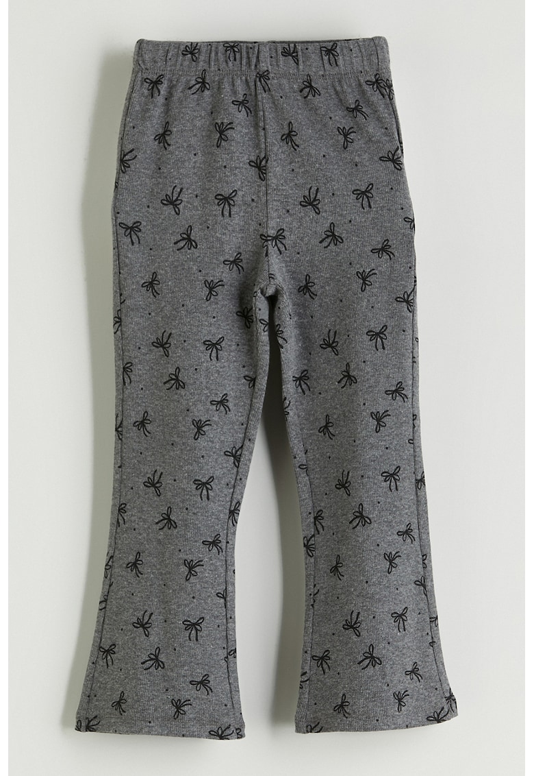 Pantaloni evazati cu imprimeu