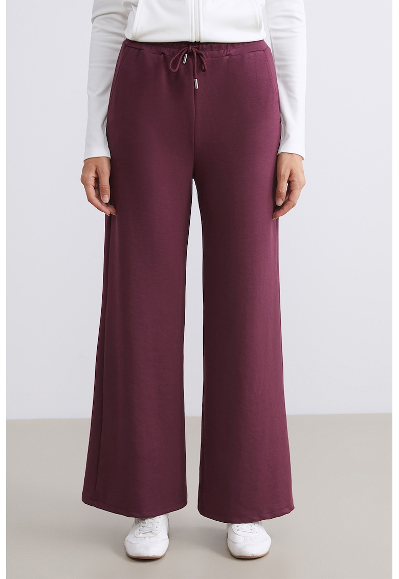 Pantaloni evazati de trening cu snur in talie