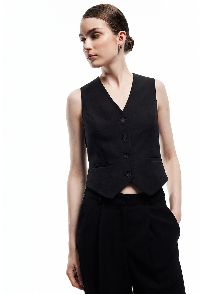 Vesta cu decolteu in V si nasturi