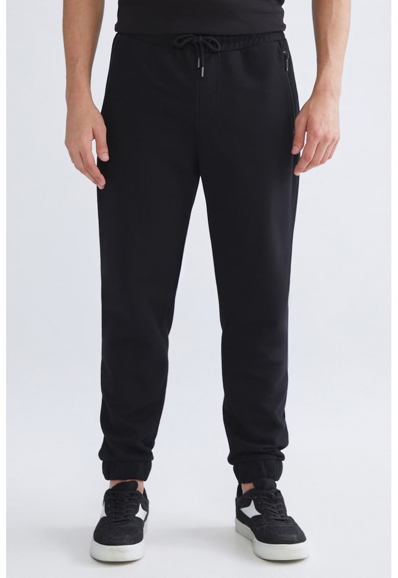 Pantaloni de trening cu snur de ajustare