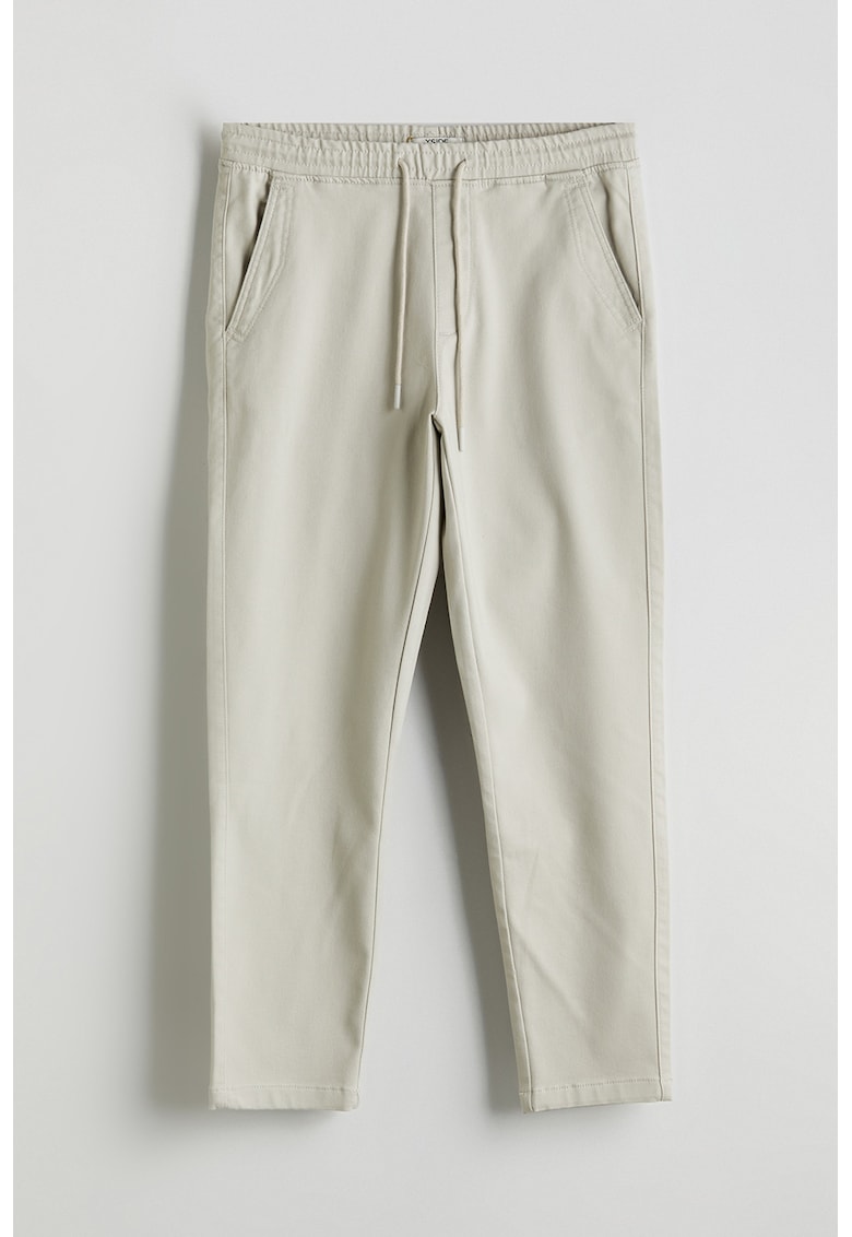 Pantaloni slim-fit cu buzunare laterale
