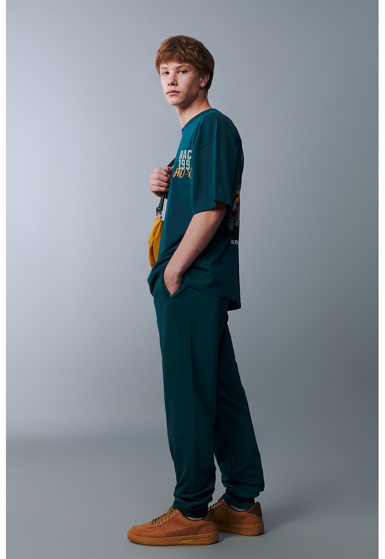 Pantaloni de trening cu buzunare cu fermoar - Albastru petrol/Albastru