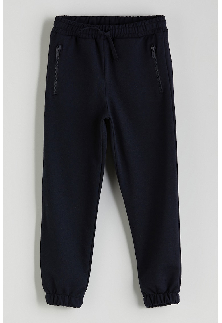 Pantaloni de trening cu buzunare cu fermoar