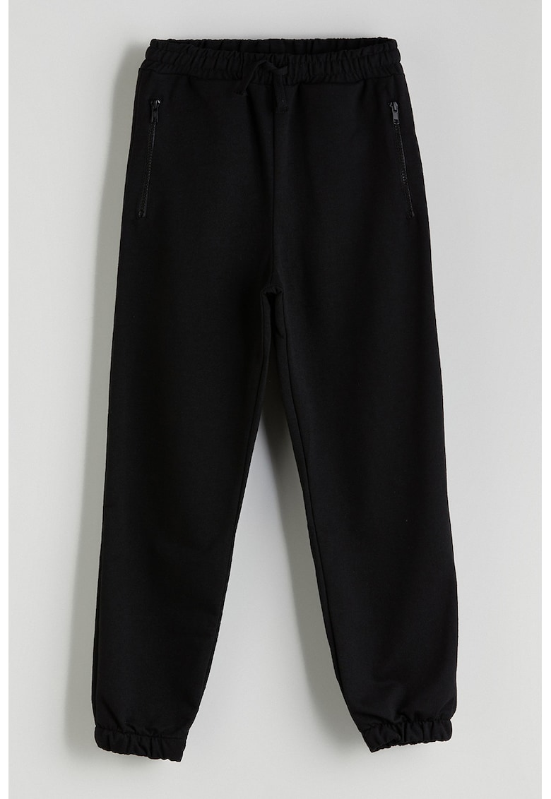 Pantaloni de trening cu buzunare cu fermoar