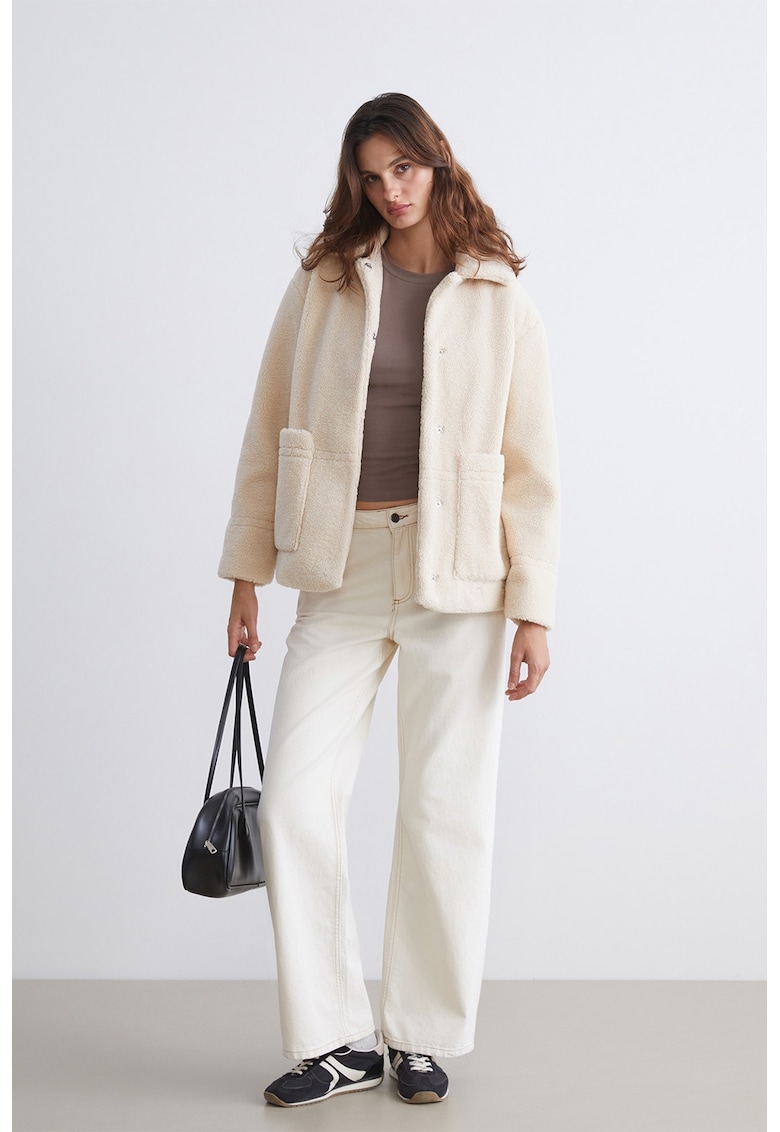 Haina scurta din teddy cu capse