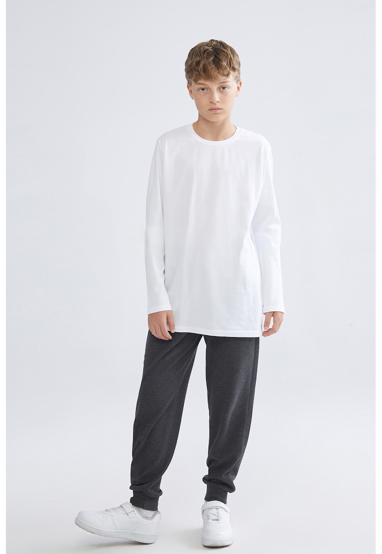 Pantaloni de trening din material pique cu model uni