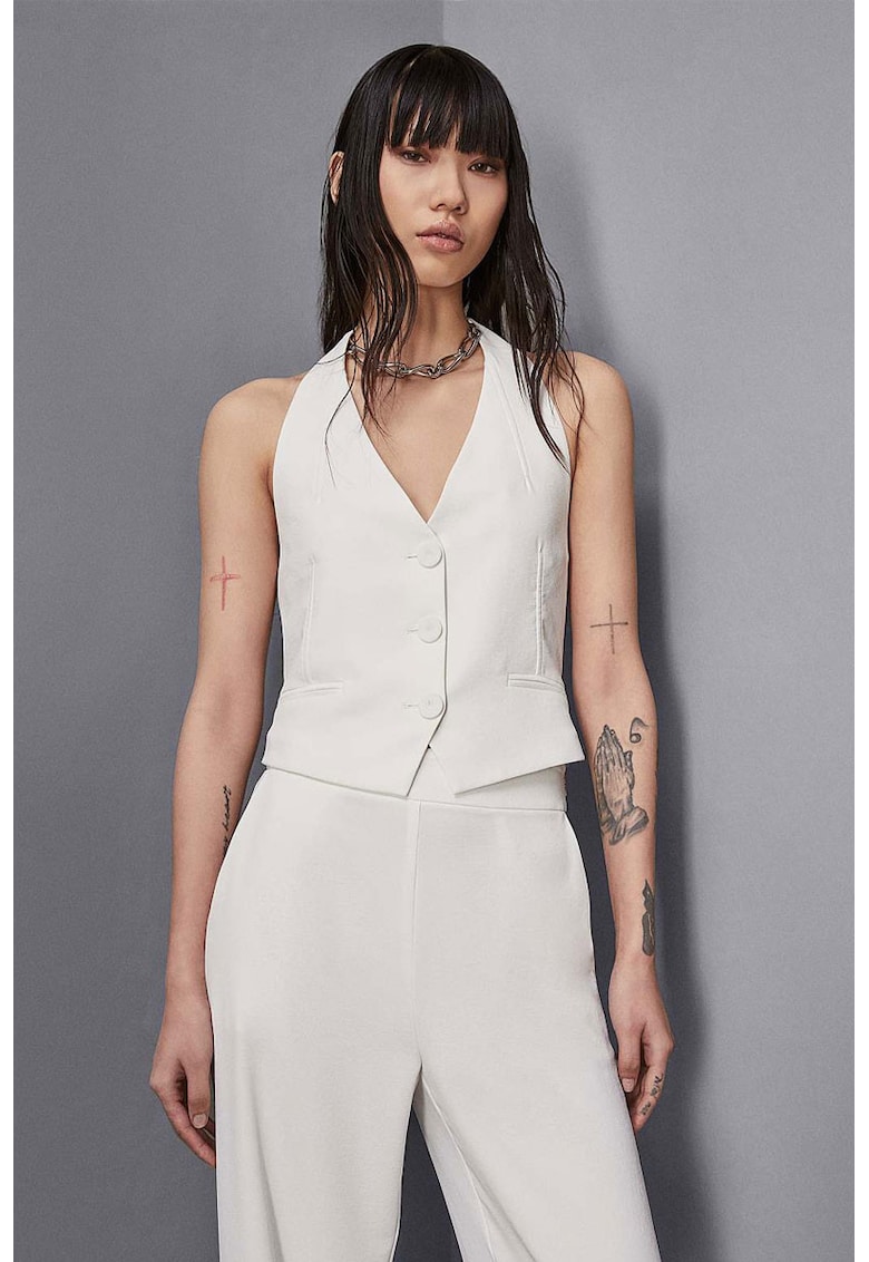 Vesta cu spatele gol