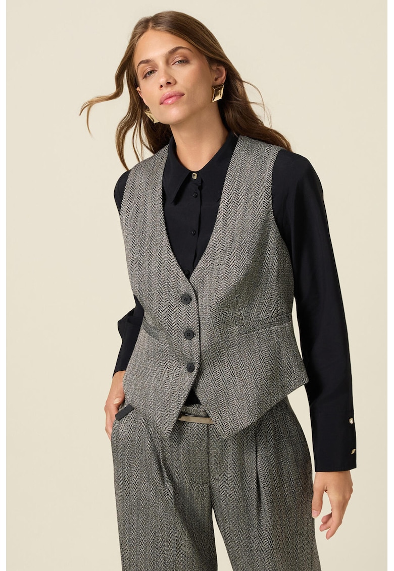 Vesta cu decolteu in V si model herringbone