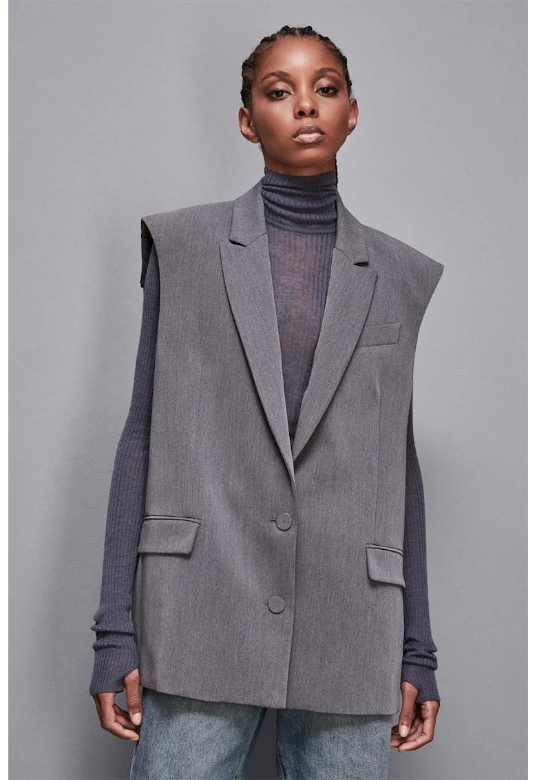 Vesta supradimensionata cu inchidere la un singur rand de nasturi