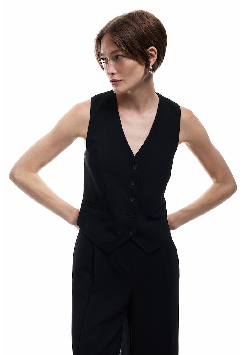 Vesta cu decolteu in V si nasturi