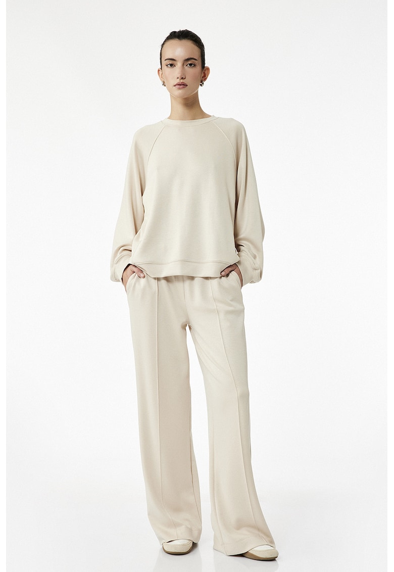 Pantaloni cu croiala ampla si talie elastica - Bej deschis