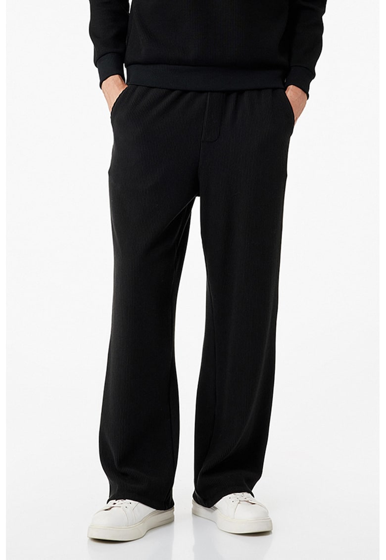 Pantaloni din amestec de bumbac cu croiala ampla si talie elastica