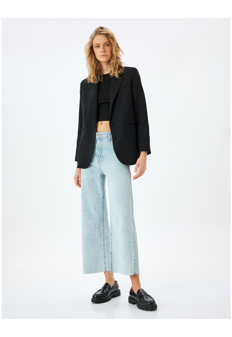 Blugi ampli cu talie joasa