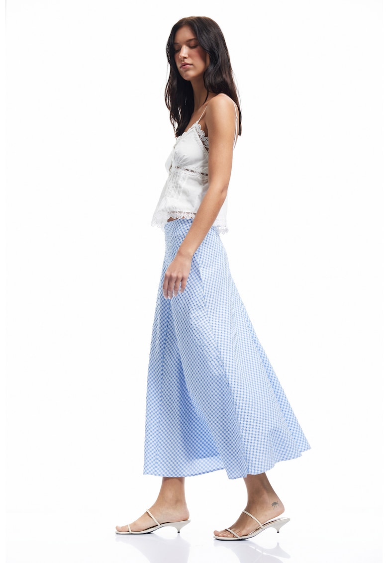 Fusta cu croiala pe bie si model in carouri