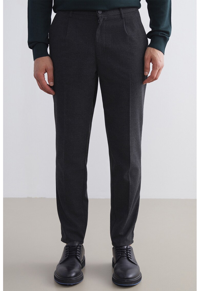 Pantaloni uni cu buzunare oblice