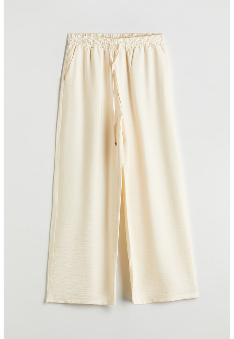 Pantaloni cu croiala ampla si snur in talie