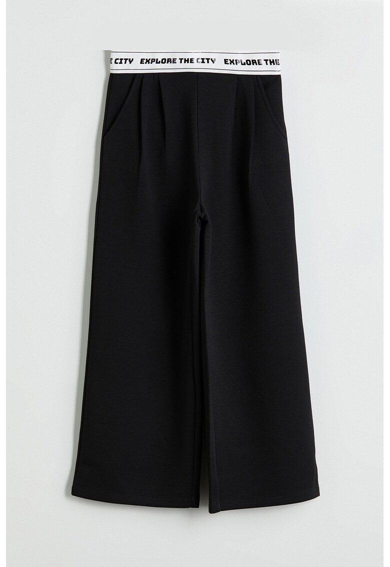 Pantaloni de trening ampli cu banda elastica in talie