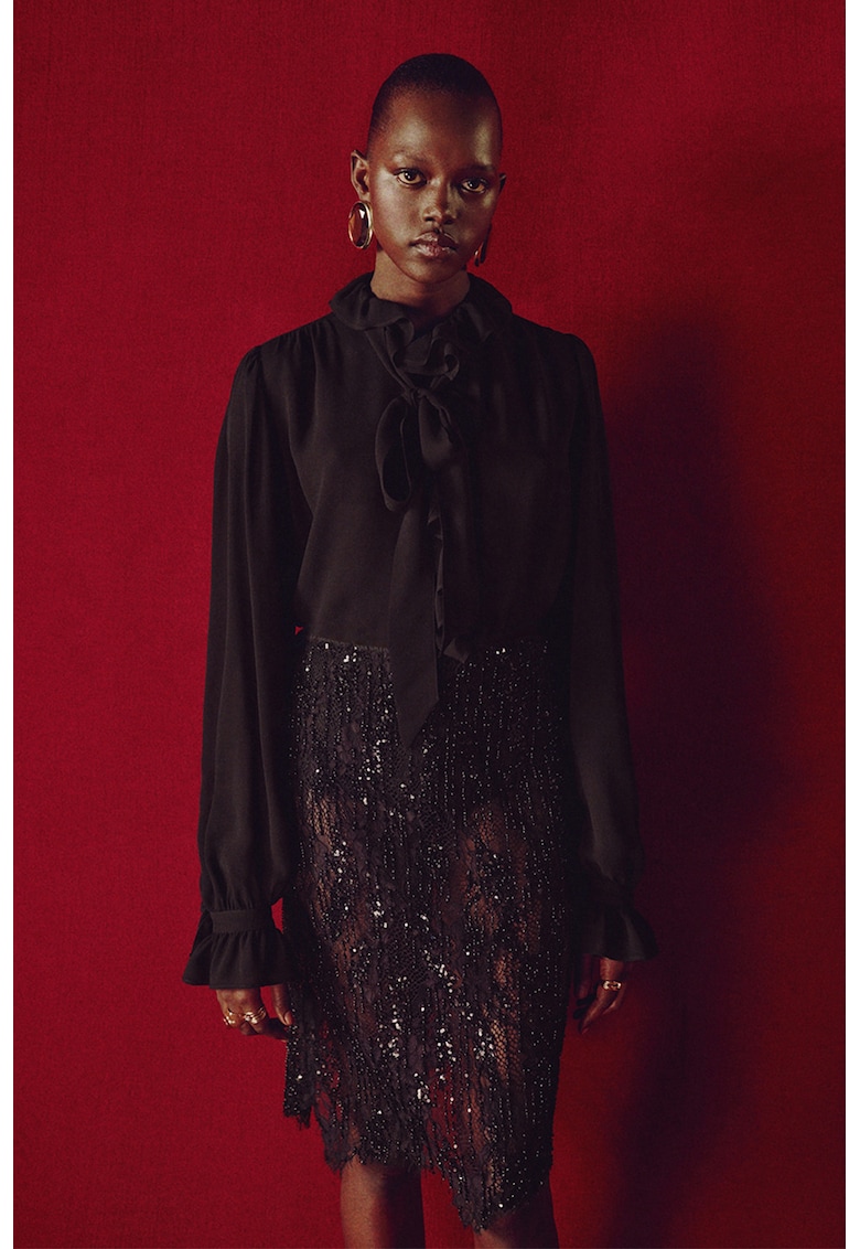 Bluza vaporoasa cu volane