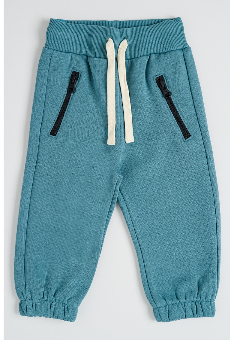 Pantaloni de trening cu snur si buzunare cu fermoar