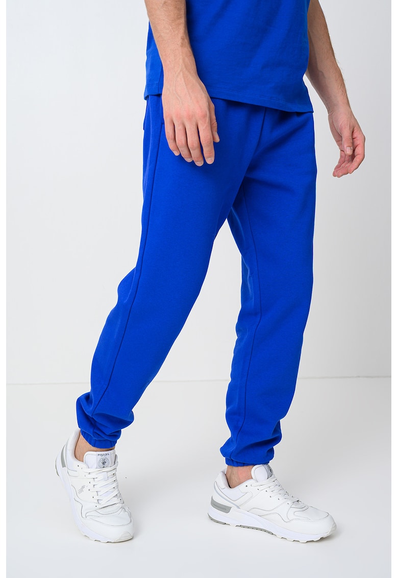 Pantaloni relaxed fit de trening cu talie elastica