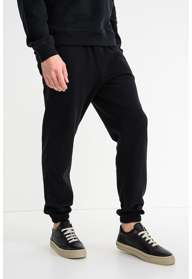 Pantaloni de trening din amestec de bumbac organic cu talie medie si snur de ajustare