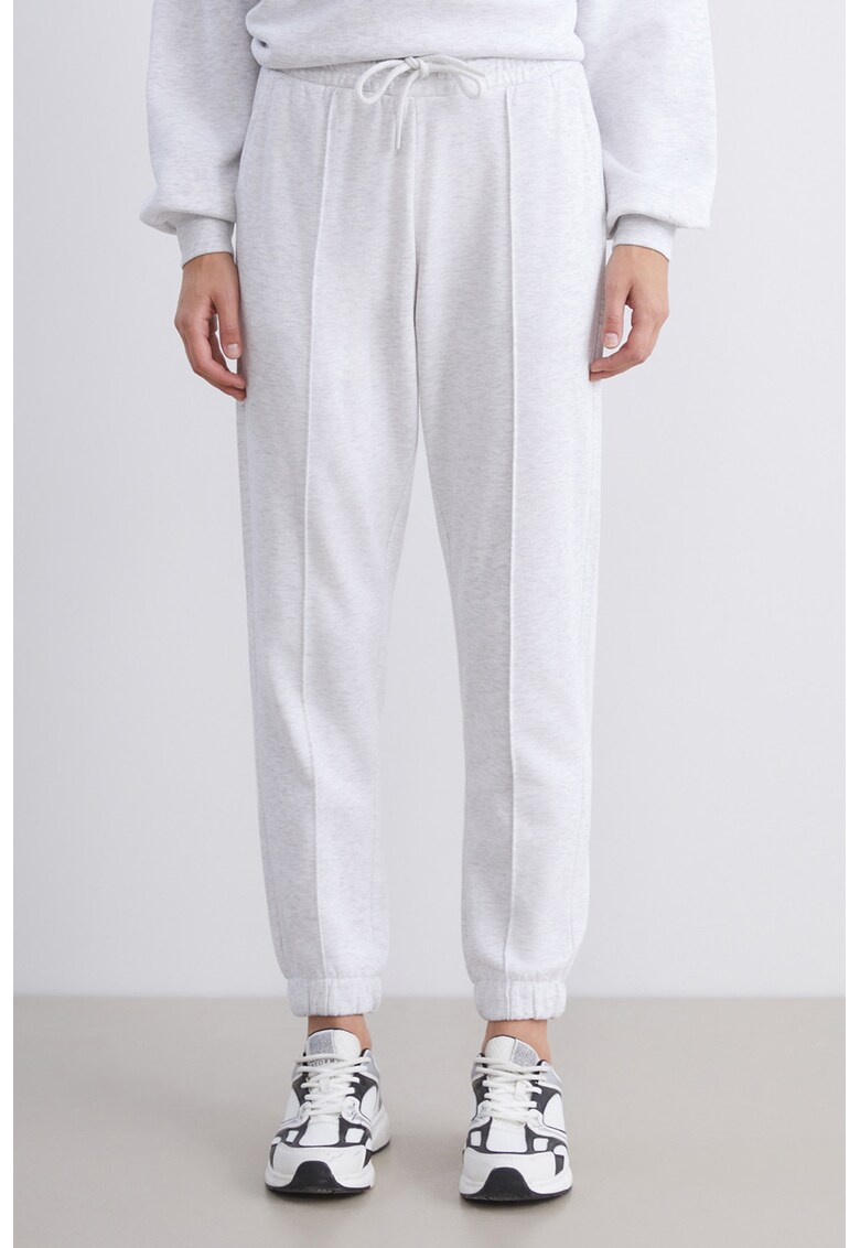 Pantaloni de trening regular fit cu cusaturi frontale - Gri deschis melange