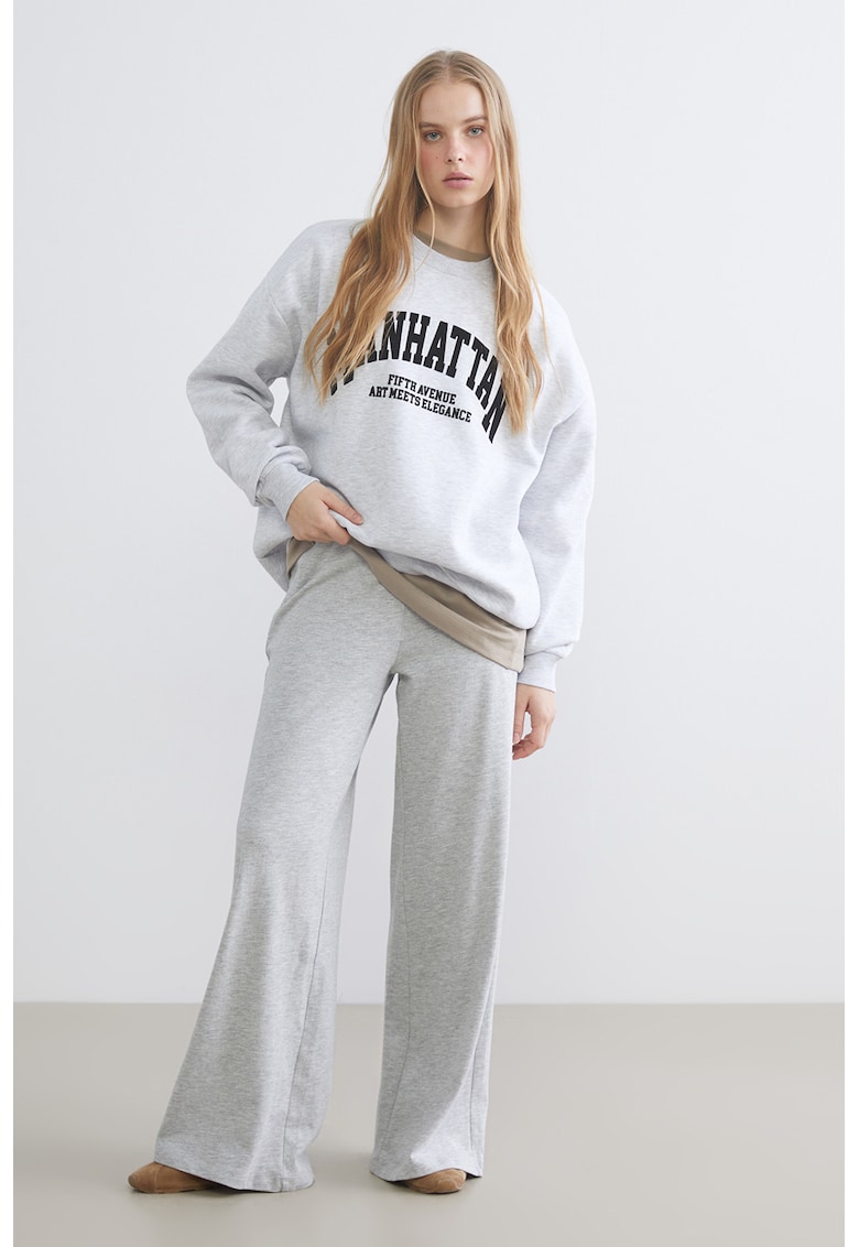 Pantaloni de trening relaxed fit cu buzunare oblice