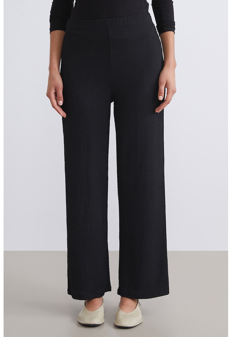 Pantaloni cu talie medie si model uni