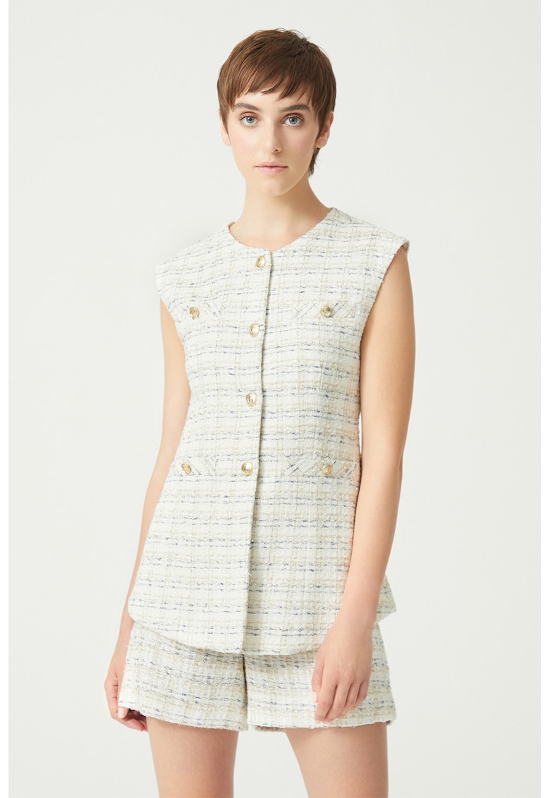 Vesta din tuid cu nasturi