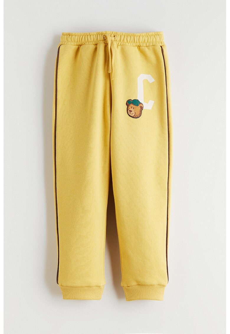 Pantaloni de trening cu imprimeu si snur in talie - Galben pai