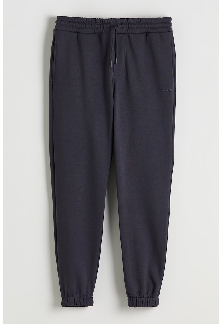 Pantaloni de trening relaxed fit cu buzunare laterale - Gri inchis