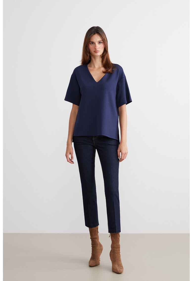 Blugi slim fit din amestec de lyocell cu pliuri - Albastru inchis