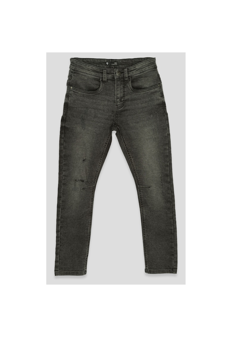 Blugi rupti slim fit usor decolorati -