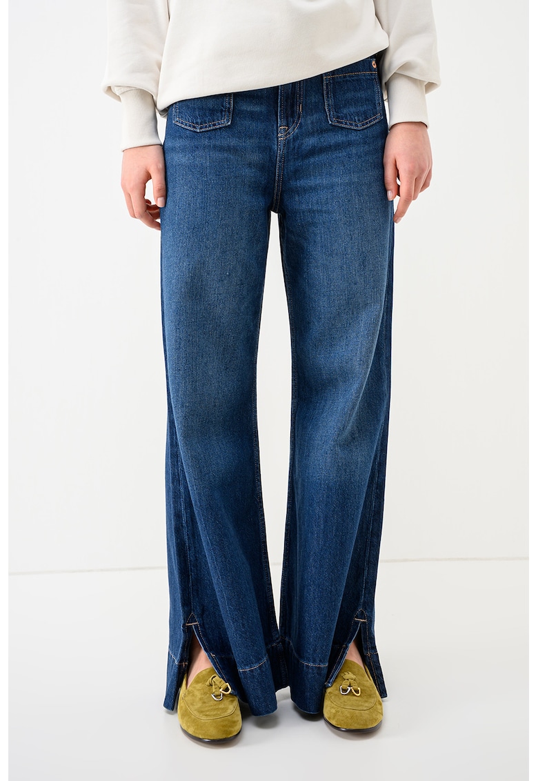 Blugi evazati cu slituri la terminatie - Albastru inchis