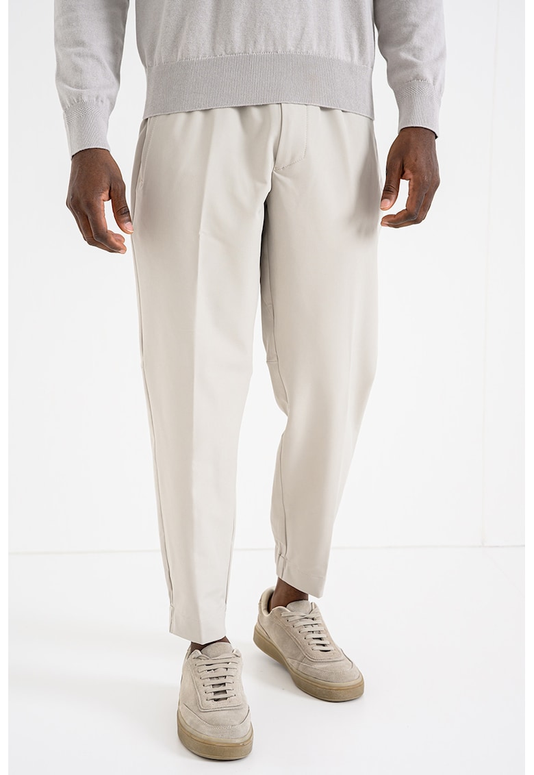 Pantaloni de trening cu croiala conica Flex - Bej deschis