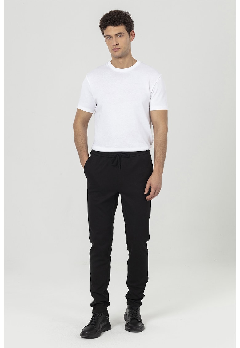 Pantaloni de trening cu croiala regular-fit si model uni