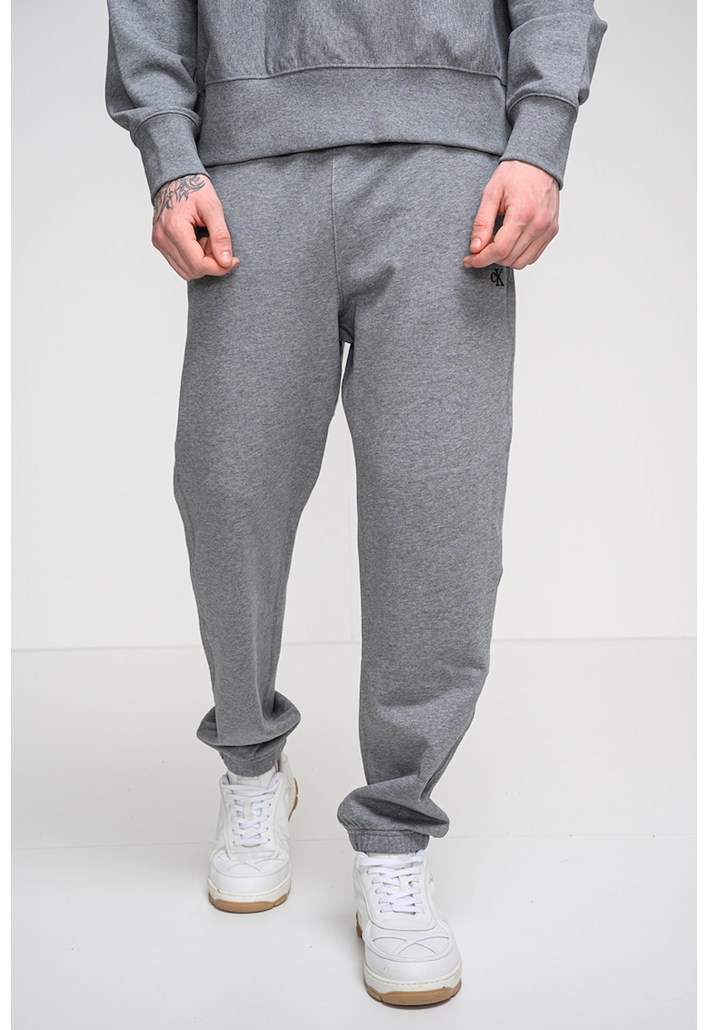 Pantaloni de trening relaxed fit cu terminatie elastica - Gri melange